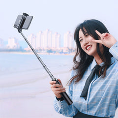 A Photo Of Baseus Fully Folding Selfie Stick with Tripod and Bluetooth Control - Aluminum Alloy