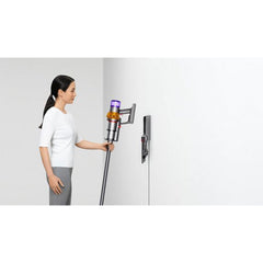 A Photo Of Dyson V15 Detect, Dyson’s most powerful, most intelligent cordless vacuum. With laser illumination.