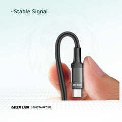 A Photo Of Green Lion USB-C to AUX Braided Cable 1M - Black | Durable & Clear Sound Quality