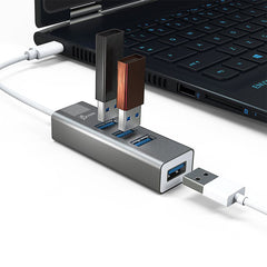 A Photo Of J5Create USB-C™ 4-Port Hub JCH344 - High-Speed USB 3.1 (Gen 1) Hub Compatible with Windows®, macOS®, Linux®, Chrome OS™