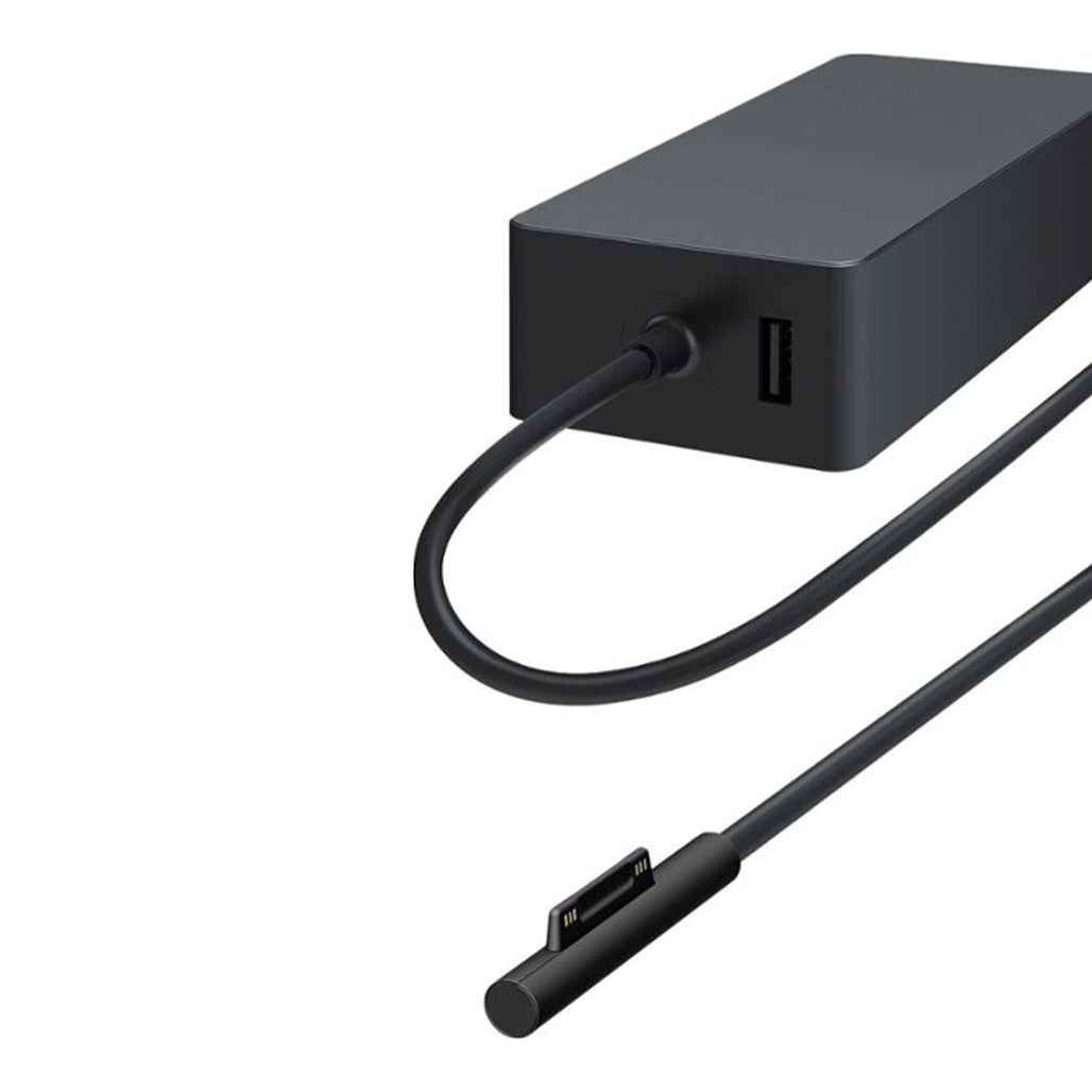 A Photo Of Microsoft Surface 65W Power Supply - Black | Dual Device Charger with Magnetic Connector