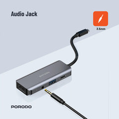 A Photo Of Porodo 4-in-1 USB-C Hub with 100W PD, 4K HDMI, USB 3.0 & 3.5mm Aux – Grey