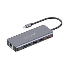 A Photo Of Porodo 9-in-1 USB-C Hub with 100W PD, 4K HDMI, Ethernet, SD Card, USB 3.2, and 3.5mm Aux - Gray