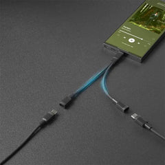 A Photo Of Porodo 2in1 Type-C to 2*Type-C Jack Headphone and Charging Converter Adapter - Black