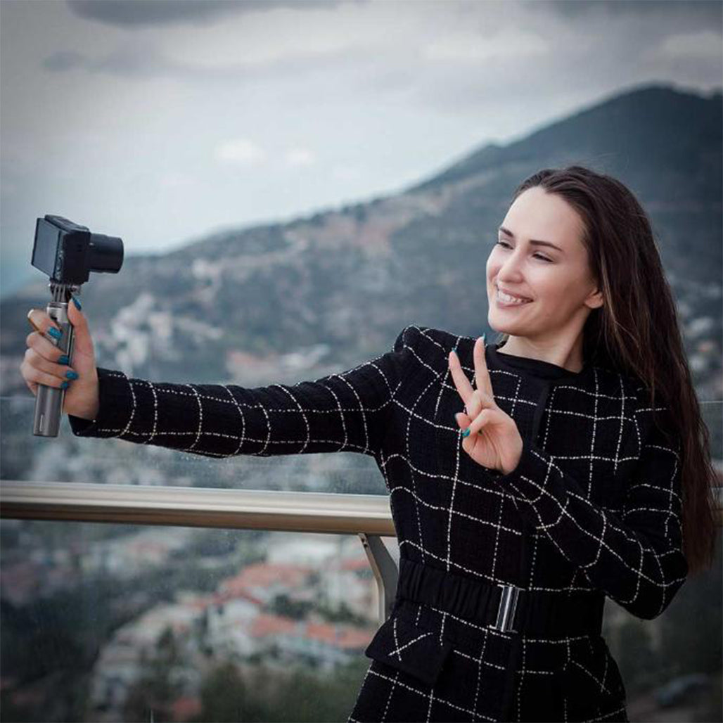 A Photo Of Porodo 135cm Extendable Selfie Stick with Detachable Light & 4-Leg Tripod - Bluetooth 5.2, Black