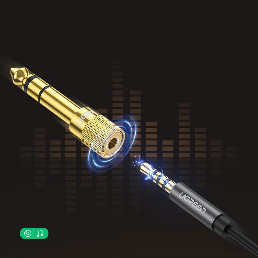 A Photo Of UGreen 3.5mm to 6.35mm Headphone Jack Adapter | Gold-Plated Audio Converter