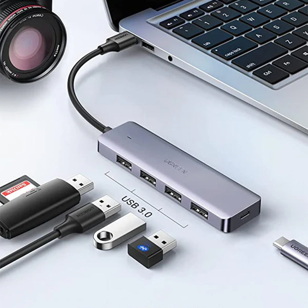 A Photo Of UGreen USB 3.0 Ultra Slim 4-Port Hub | High-Speed Data Transfer and Extra Power Supply