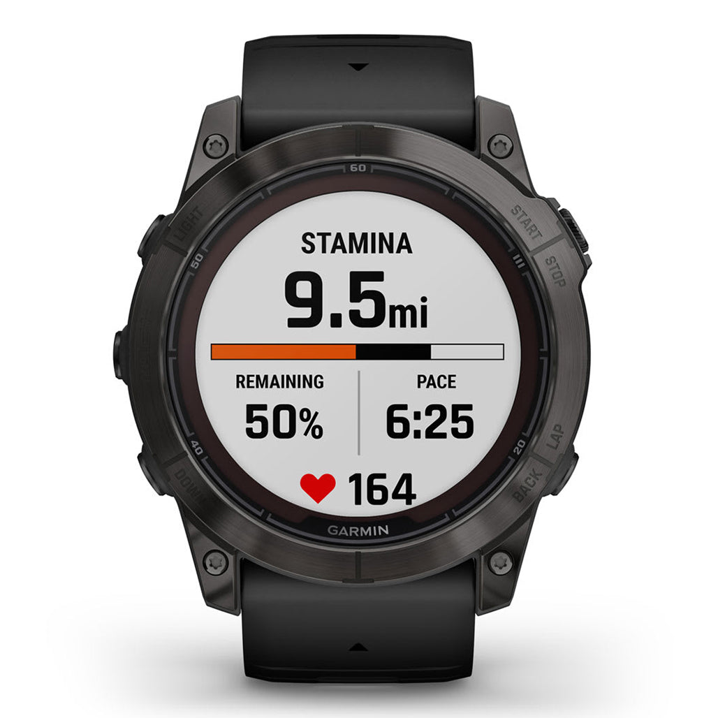 A Photo Of Garmin Fēnix® 7X Pro Sapphire Solar Edition - Titanium with Fog Gray/Ember Orange Band