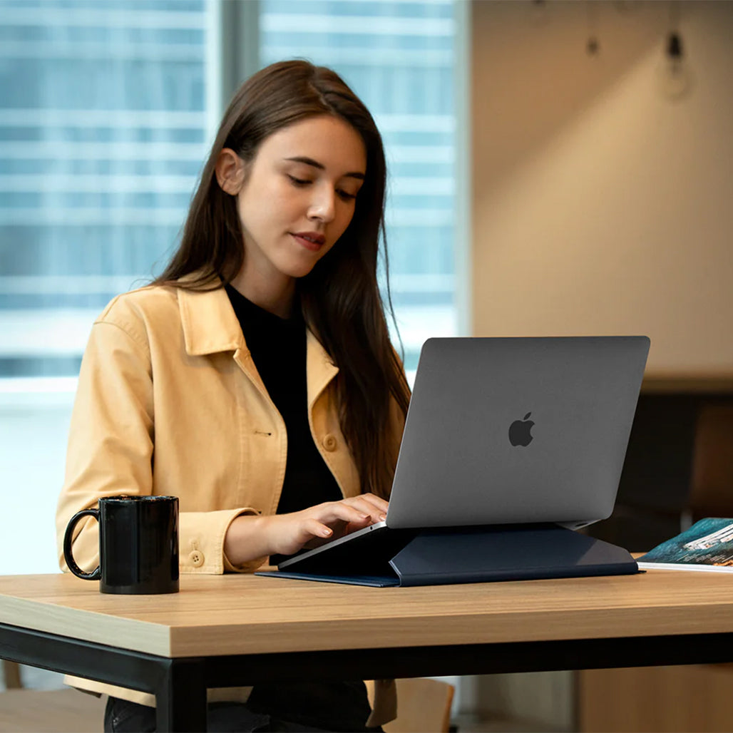 A Photo Of Uniq Oslo 2-in-1 Laptop Sleeve with Foldable Smart Stand for Laptops up to 14