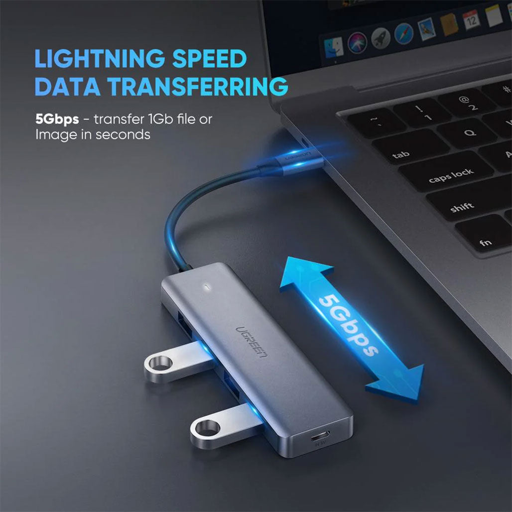 A Photo Of UGreen 4-Port USB 3.0 Hub with USB-C Connector – Expand Your Connectivity with High-Speed Data Transfer